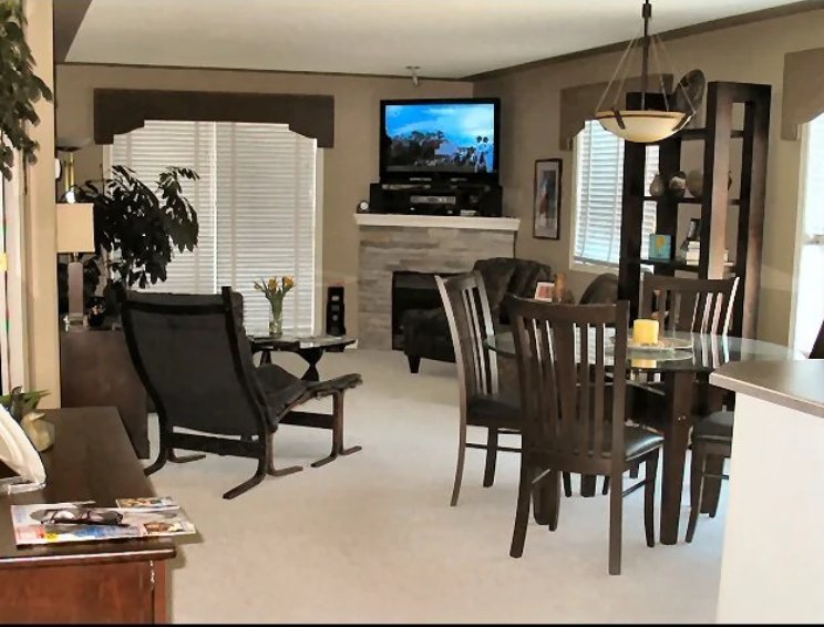 Living and dining room with fireplace